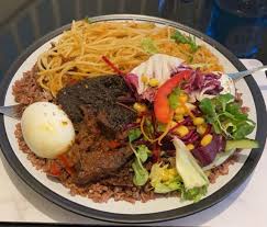 Waakye with Salad, Gari, Noodles and Chicken, Fish or Egg